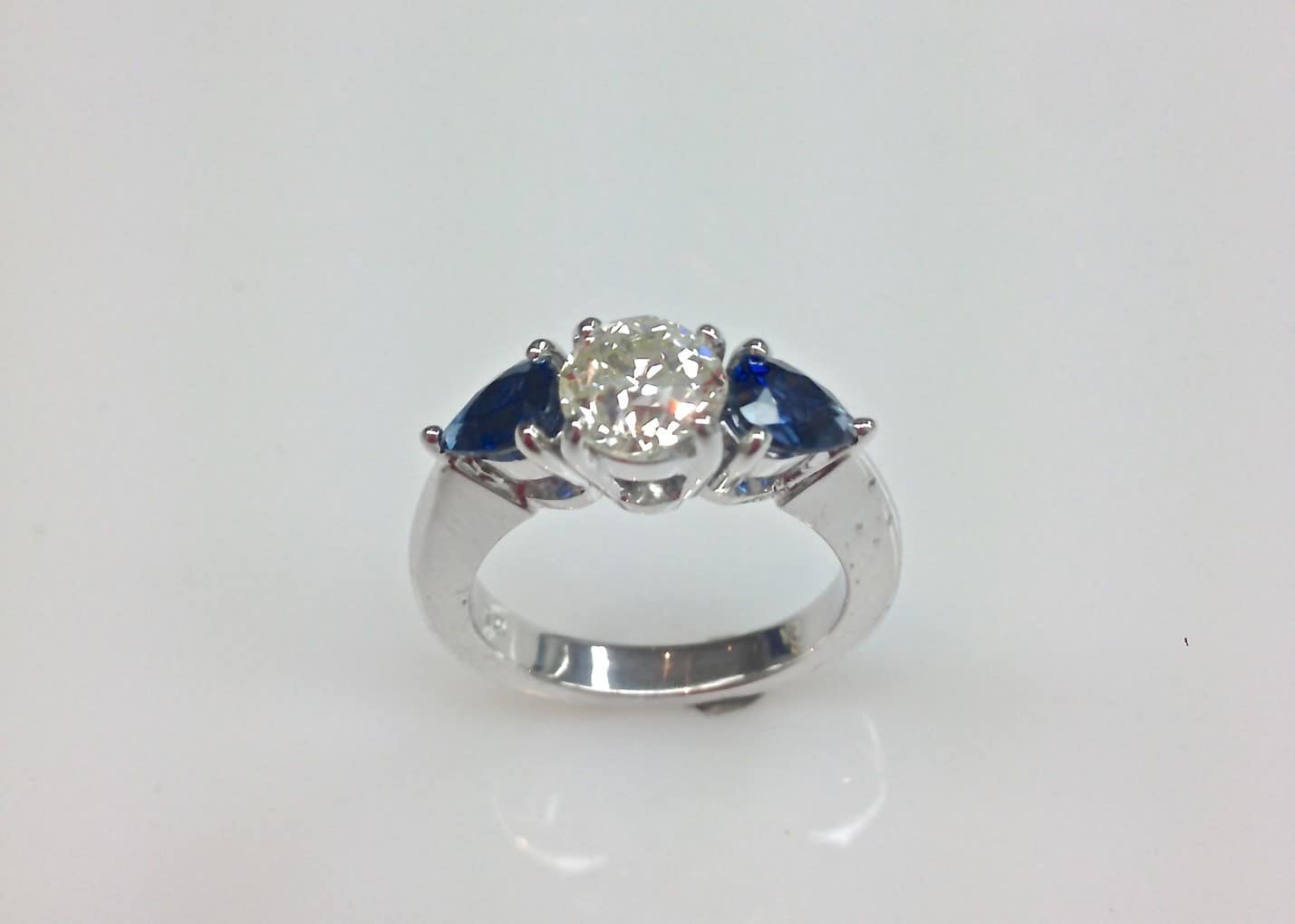 Trilliant Cut Three Stone Sapphire Ring | Keezing Kreations