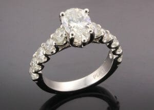 Linda pear diamond ring with side stones