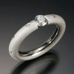 tension set diamond ring by keezing kreations