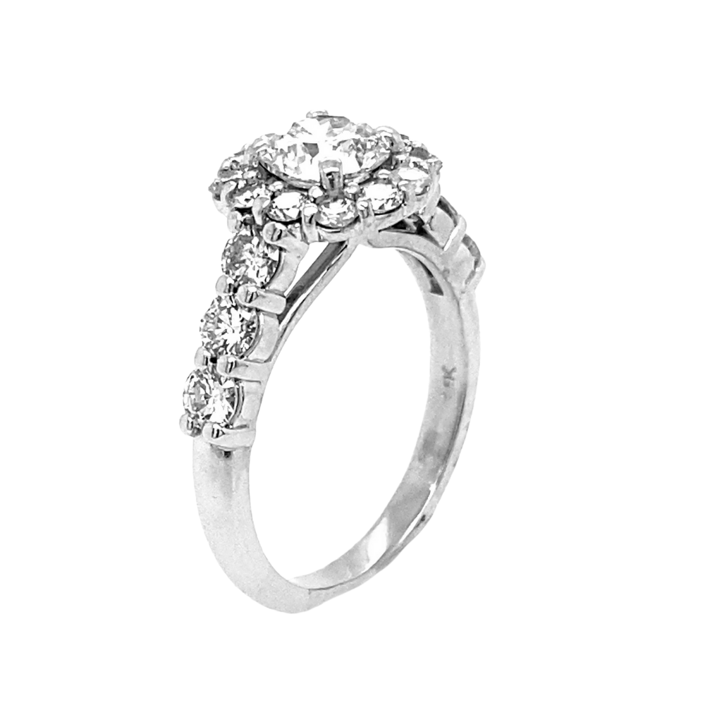 platinum halo engagement ring with side diamonds